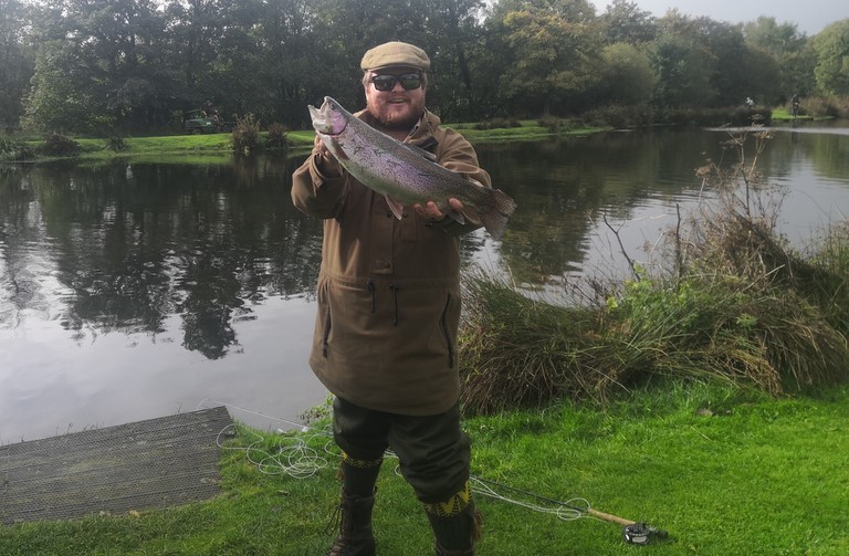 Rob with his 5lb exevalley trout.